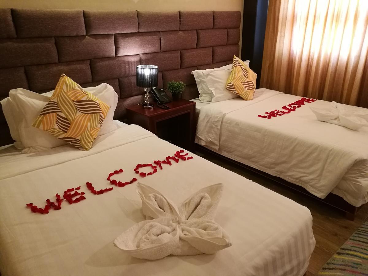 Great Wall Hotel Dár Al-Szalám Szoba fotó